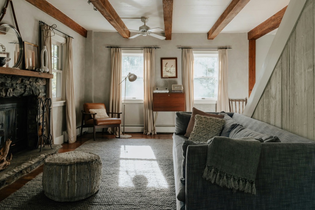 A cozy farmhouse living room in warm daylight